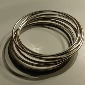 8 small silver skinny bangles